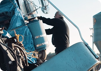 man checking on truck crash