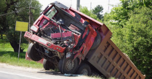 broken dump truck front after an accident