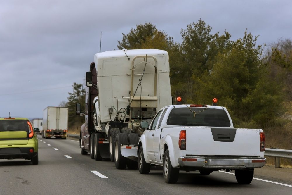 Pickup truck crashes into a truck