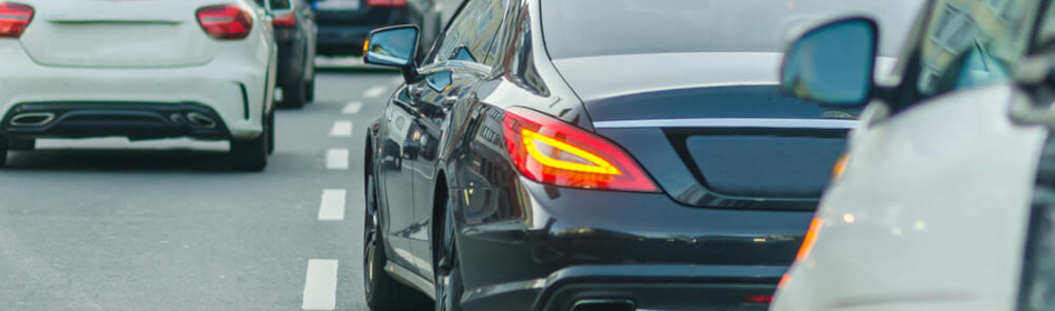 Business car in traffic on the road.