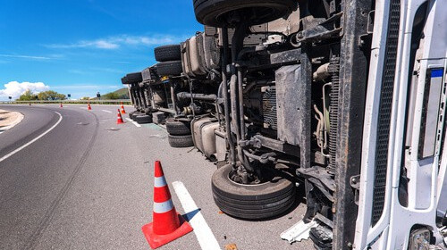 Commercial truck rolled over on highway