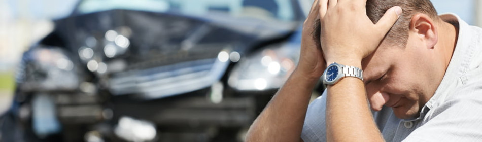 Man injured after accident holds his head