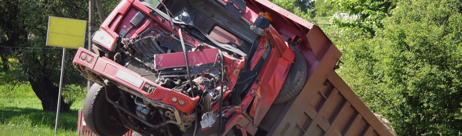 broken dump truck front after an accident
