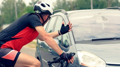 car and bike colliding