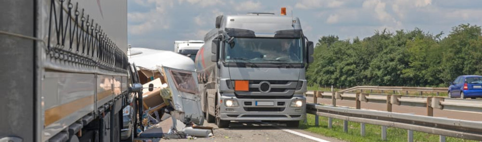 Damaged truck by the side of the road