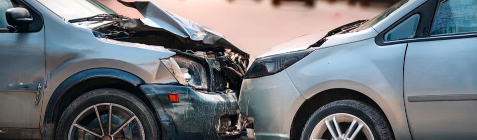 Two cars colliding head-on