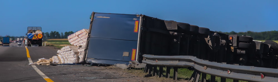 Overturned semi-truck on highway