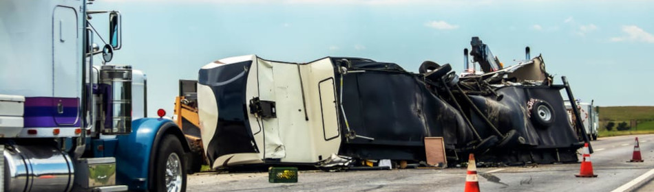 Truck overturned on the road after an accident