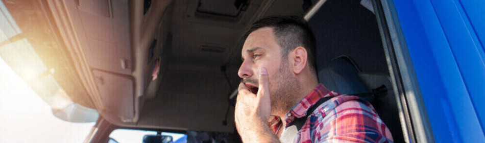 Bus driver yawns while driving