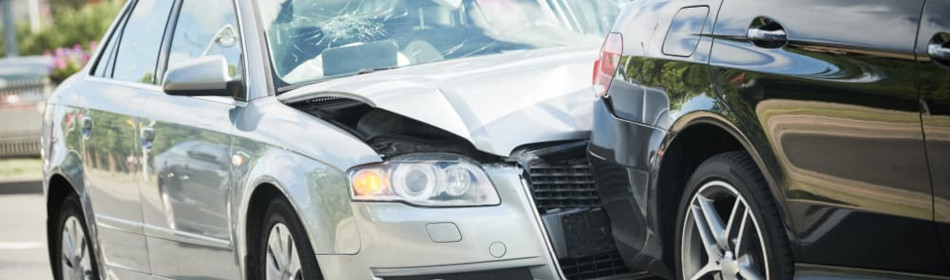 cars collide on the road