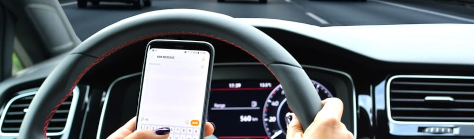 Woman texting while driving