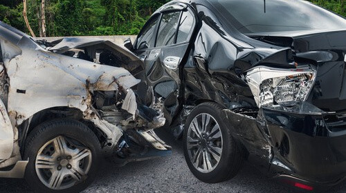 Two totaled cars after a T-bone crash