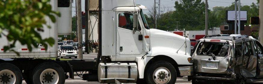 Truck crashes into vehicle at rear end